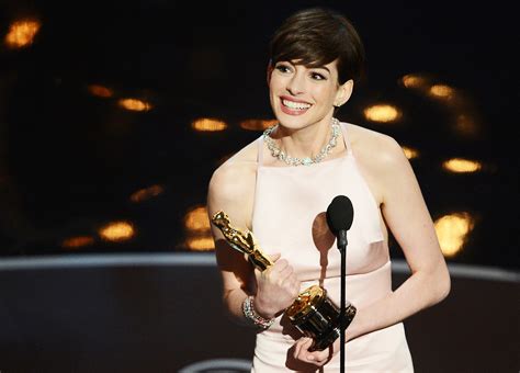 Anne Hathaway Poses Topless, Talks 2013 Oscar Nipplegate